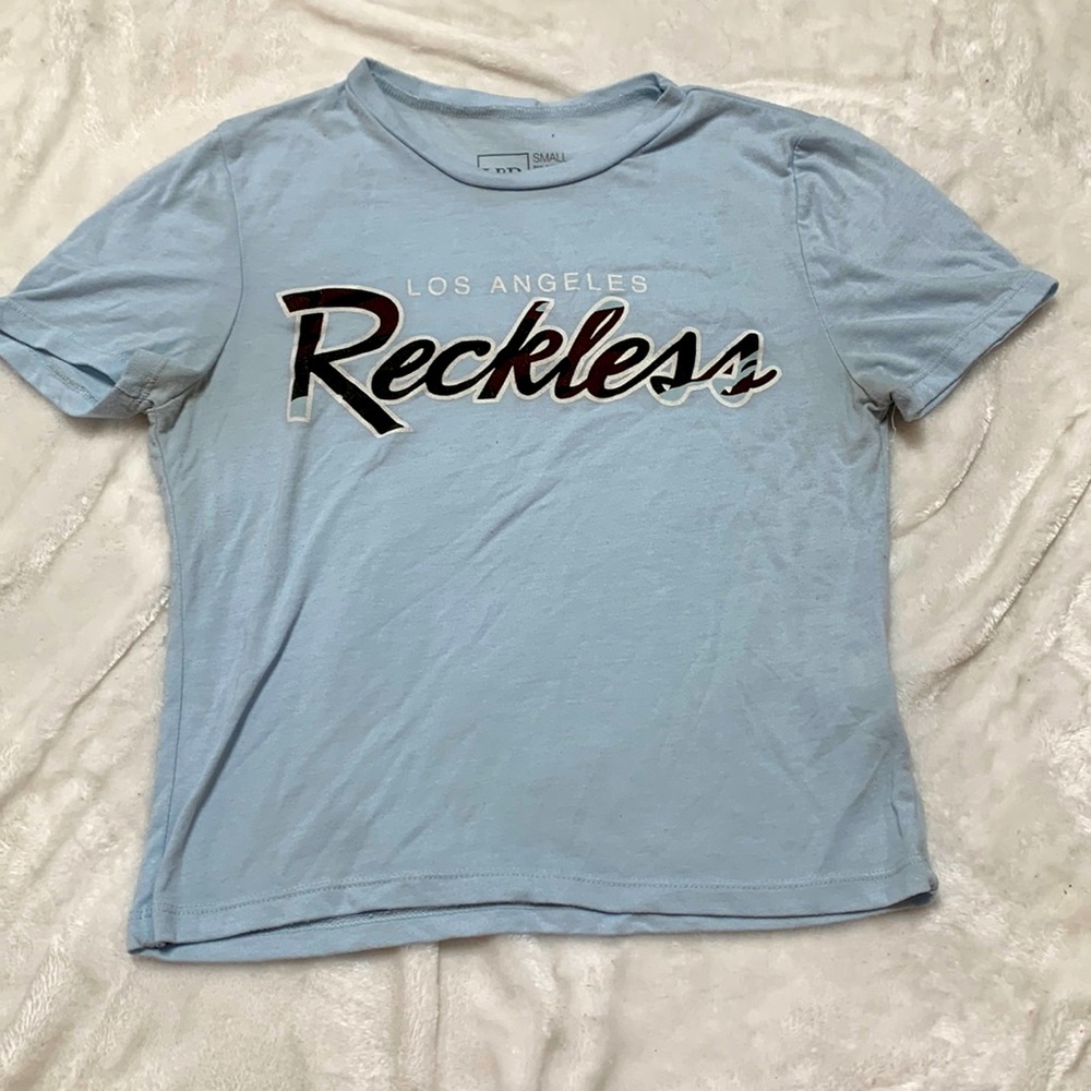 Young and reckless light blue shirt